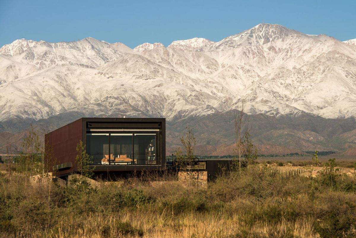 Edgy modern andes house wrapped in a rusty metal shell  2