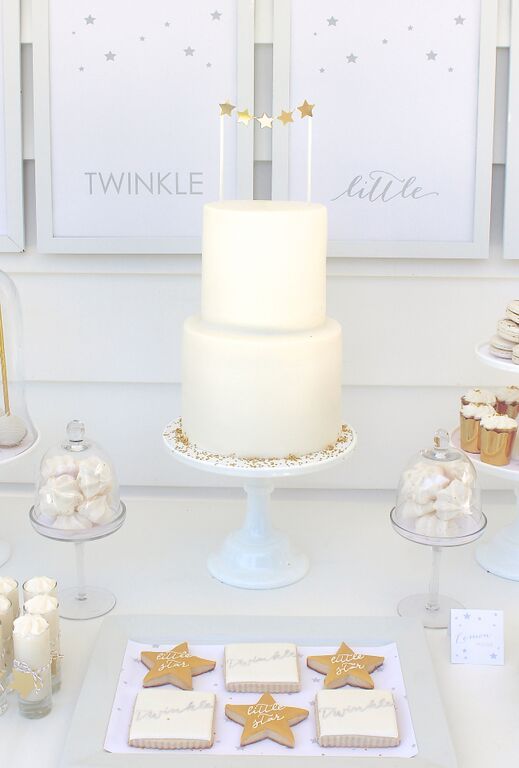 elegant all-white dessert table for a gender neutral baby shower