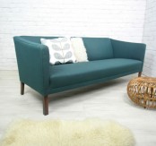 a blue mid-century modern sofa is a catchy and bold addition to any living room, it’s a stylish and timeless solution