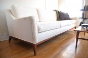 an elegant creamy mid-century modern sofa with printed upholstery is a chic and cool idea for any space, though with no kids and pets