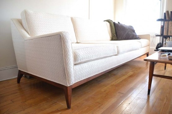 an elegant creamy mid-century modern sofa with printed upholstery is a chic and cool idea for any space, though with no kids and pets