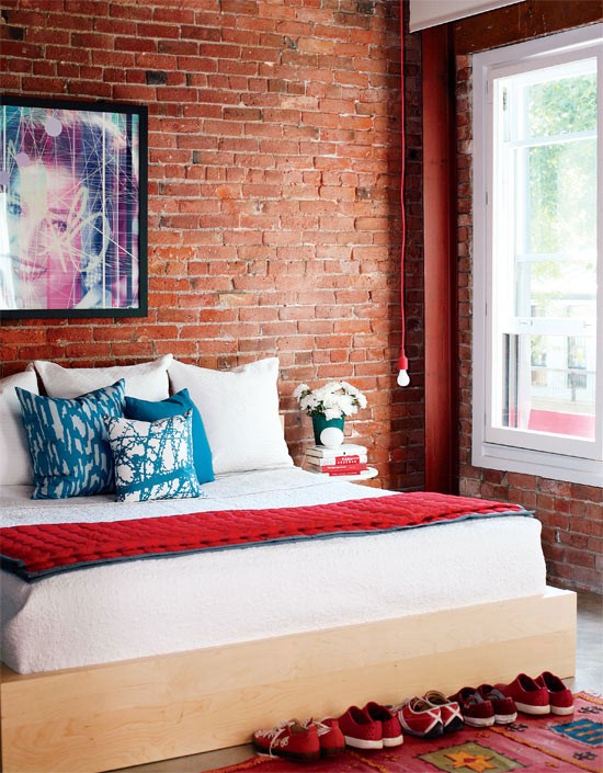 There is no need for a lot of decor elements if your bedroom has an exposed brick wall.