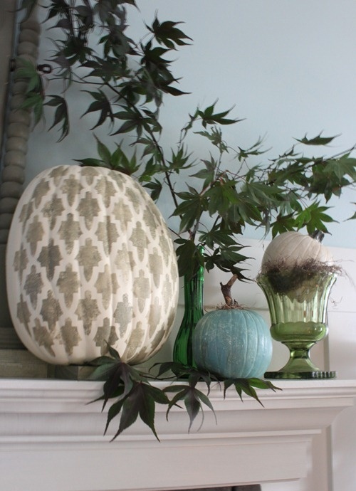 A blue, a blush printed and a grey metallic pumpkin will look non traditional and add a fall feel to the space