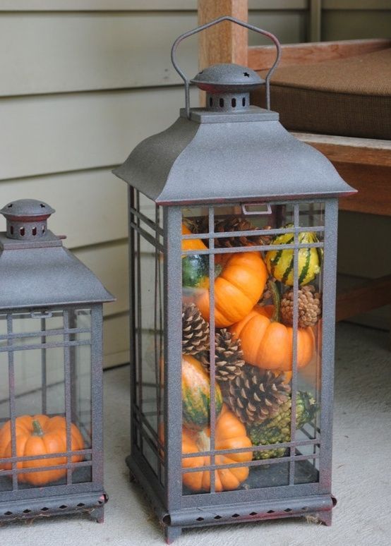 Mixing small gourds, pumpkins and pinecones is a simple way to stuff your lanterns.