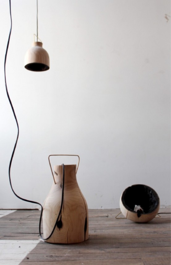 Fire Within: A Wooden Pendant Light With A Burnt Interior