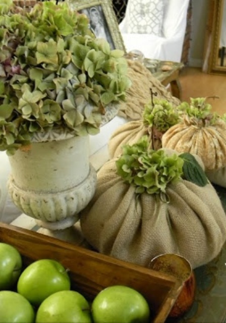 green apples, green hydrangeas, a vintage urna nd burlap sacks for a rustic Thanksgiving table or just decor