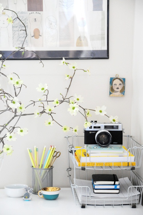 blooming branches in a vase will make your home office flourishing and very fresh