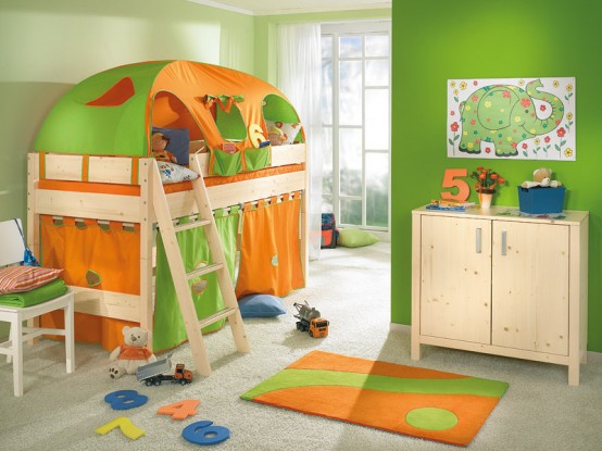 a colorful kid's room with a bold green accent wall, a bunk bed in green and orange, bright textiles, artwork and colorful numbers