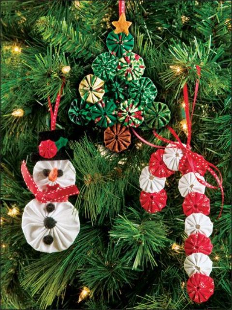 Cool and fun fabric Christmas ornaments   a snowman, a Christmas tree and a candy cane cna be DIYed and will be amazing for your tree