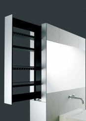 a large monolith with a mirror and a sink, with an additional drawer is a stylish idea for a modern bathroom