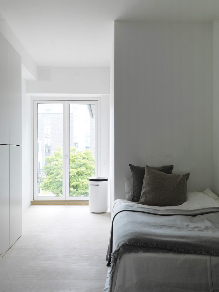like in many Scandinavian interiors, this bedroom is quite minimalsit