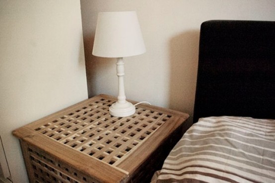 a small IKEA Hol nightstand - use the space inside for storage and place a lamp on top