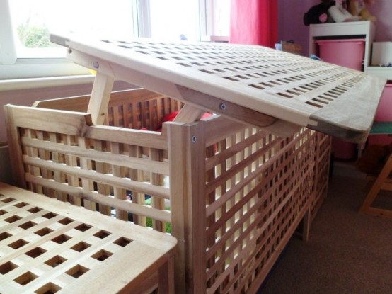 an IKEA hol table used in the nursery for storign toys and other kids' stuff is a cool idea with a casual feel