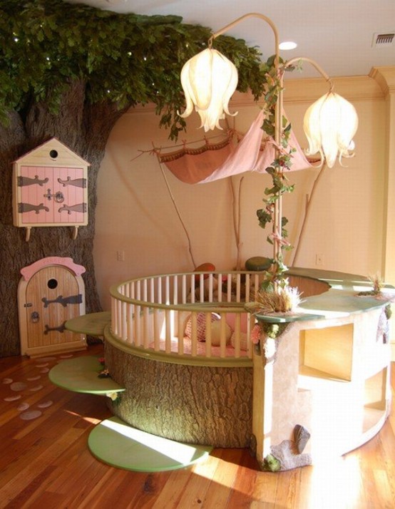 a fairy-tale girl's room with a tree with pink doors, a round kid bed with pink bedding, whimsical flower-shaped lamps and some rugs