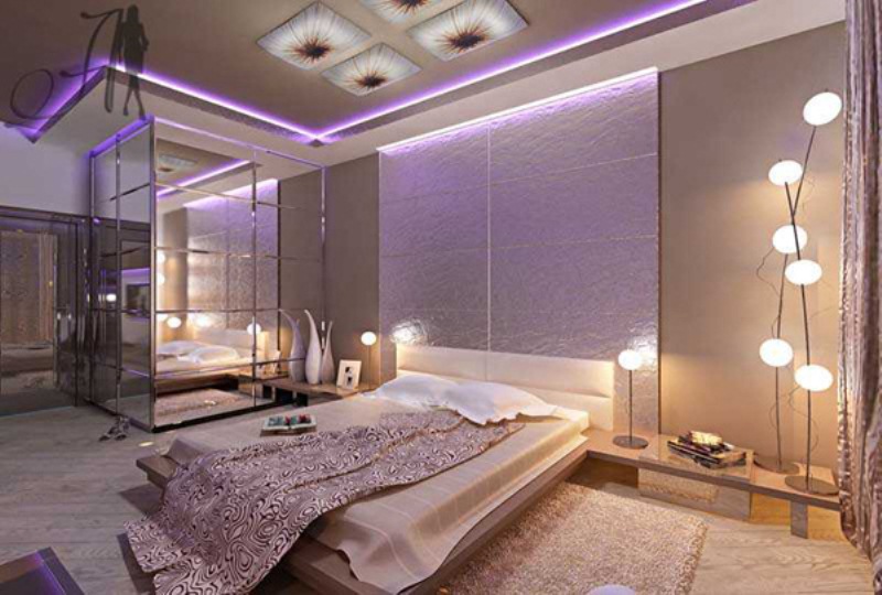 A refined glam bedroom done in neutrals, warm pastels and lilac shades plus a mirror space and lots of lamps with bubble shades