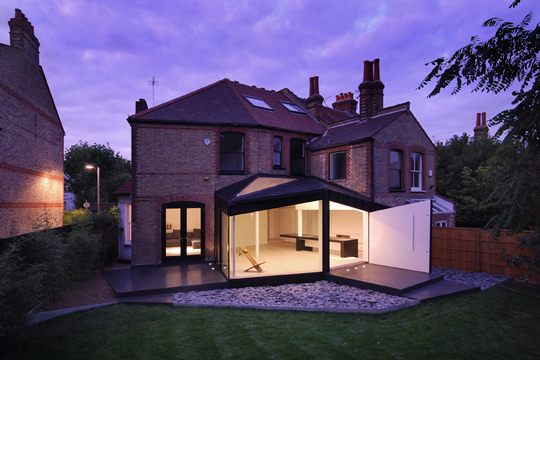 Modern Black Extension of the Victorian House