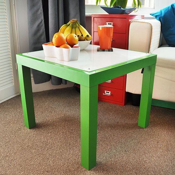 A green IKEA Lack table hack with a white tabletop is a bold and eye catchy solution that will add color to your space