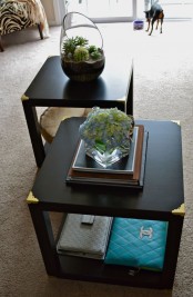 chic and refined black coffee tables with gold corners, each of them is made of two IKEA Lack tables are amazing