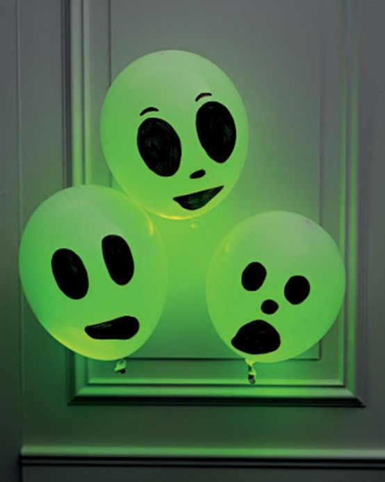 bold neon balloons with Halloween scary faces are amazing to style any Halloween space