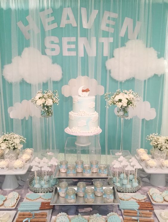 heaven-themed dessert table for a boy baby shower