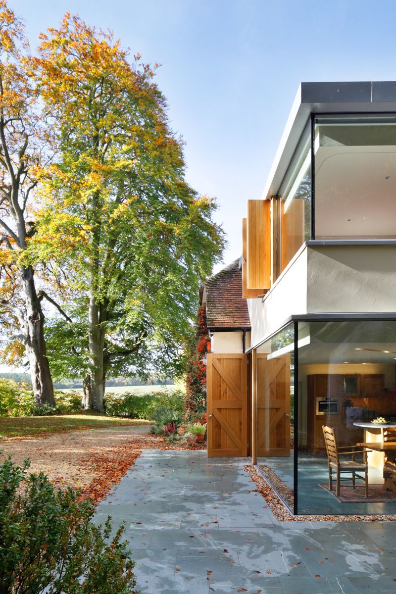 Historical english cottage with a glazed cantilevered extension  5