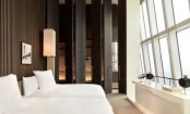 Hotel Bedroom With Huge Doors And Windows