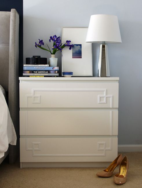 a white IKEA Malm dresser as a nightstand with elegant trim is an easy hack to realize