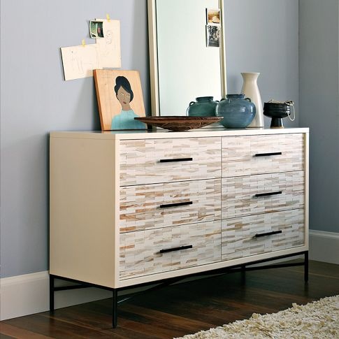 a catchy Malm hack with printed contact paper, black handles and framing and legs