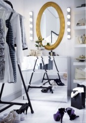 a glam and bold IKEA Malm dresser hack with mirrors all over is a cool idea for a closet