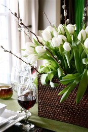 an elegant box with white tulips and willow is a stylish idea of a spring or Easter centerpiece that always works