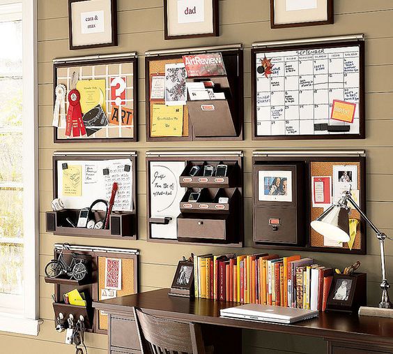 Wall mounted storage units with various holders, shelves and other storage items is perfect for a small office