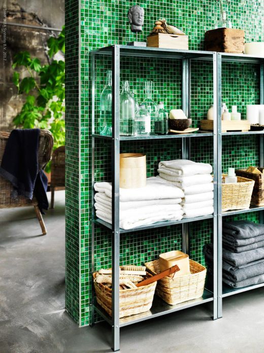 IKEA Hyllis shelves with towels and all the possible bathroom stuff stored on them