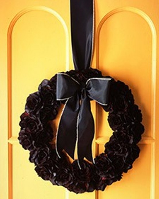 If your front door is bright and colorful then completely black wreath would look truly gorgeous on it.