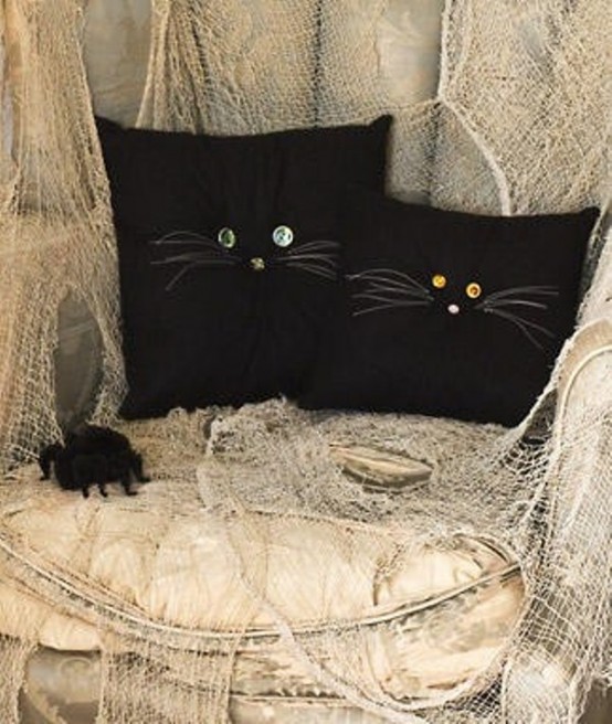 Turn your throw pillows into a cute, magical cats.
