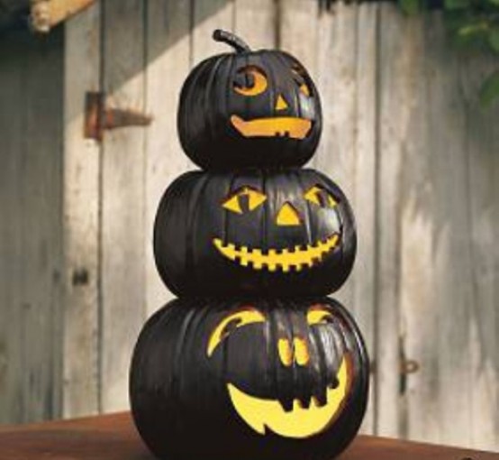 For a more original look paint your jack-o-lanterns in several coats of glossy black. You'd be amazed how cool they'd look like.