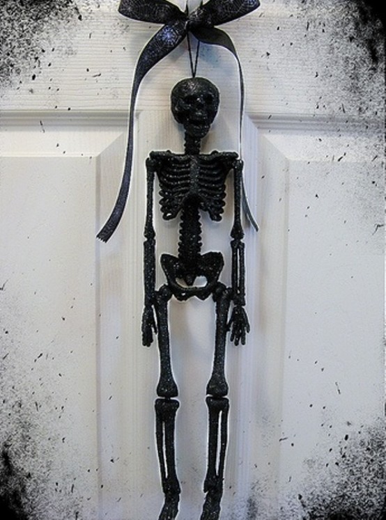 In case you aren't fond of round wreaths, you can hang a skeleton figure on yours.