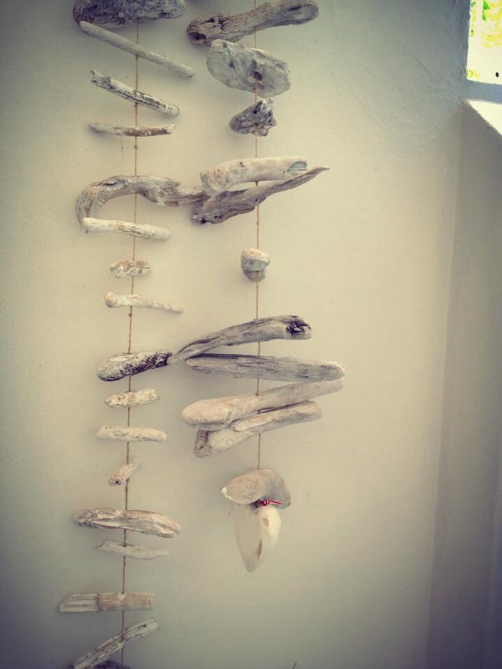 driftwood mobiles are easy to DIY and you may hang them anywhere you want