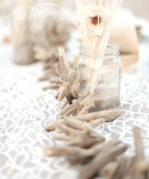 a driftwood garland can become a nice table decoration, outdoor or indoor