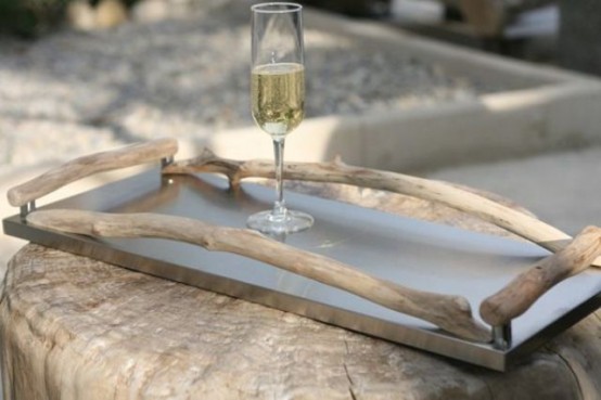 a tray decorated with driftwood for a modern beach home