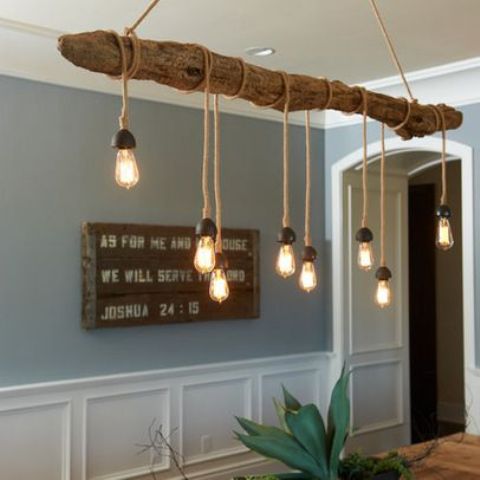 a stylish driftwood pendant lamp with many bulbs for a more relaxed feel in your space
