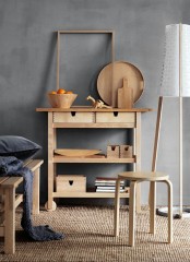 an Ikea Forhoja cart used as a usual console table – it’s great for any space due to have many open and closed storage compartments