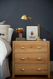 a simple and chic IKEA Tarva dresser stained light and with vintage metal handles
