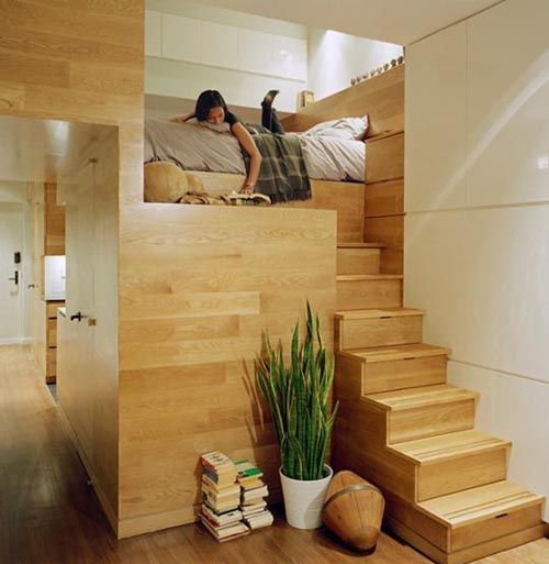 a stained Japandi loft bedroom with just a bed with neutral bedding is a lovely idea to get a separate nook for yourself