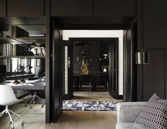 Impressive Black Interior Design With Gold And Orange Accents
