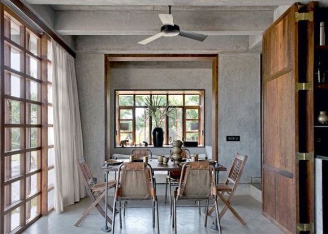 Indian house with an extensive use of concrete and reclaimed wood  4