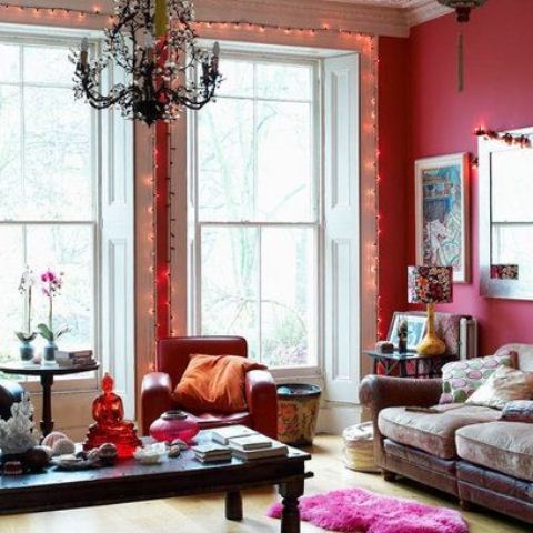 Different shades of pink could be found in most bohemian living spaces. That could be as small details like throw pillows as even whole walls painted in this color.