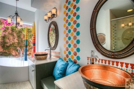 colorful star-shaped tiles to accent the wall, copper hammered sinks and chic mirror frames