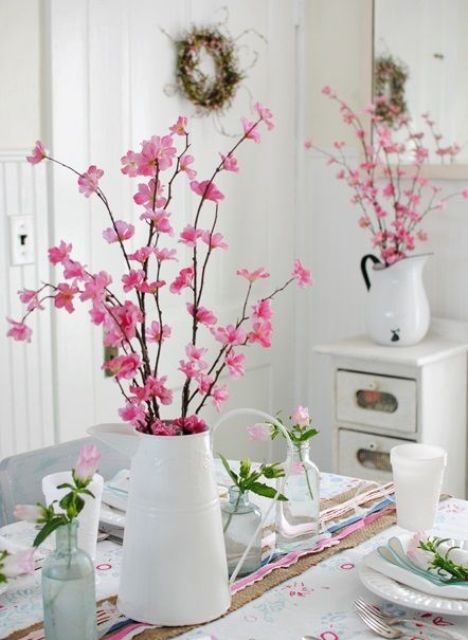 cherry blossom and pink roses make the kitchen feel more spring or summer-like and bright