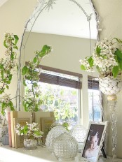 lots of blooming branches and a large mirror – you won’t need more to create a chic mantel for spring