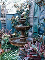 a beautiful vintage tiered fountain will give a refined vintage feel to the space and will make it fantastic
